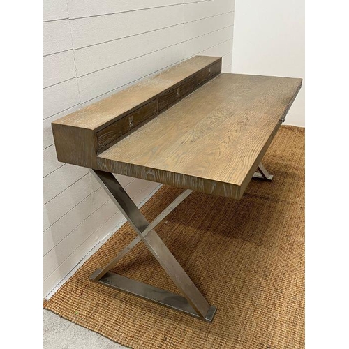 104 - A light beech chrome desk with cross chrome legs and three drawers (H88cm W160cm D80cm)