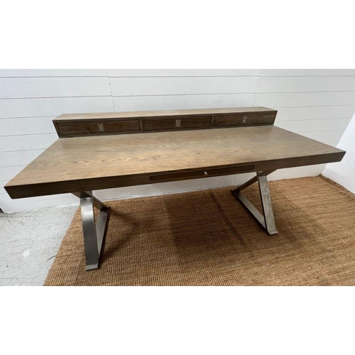 104 - A light beech chrome desk with cross chrome legs and three drawers (H88cm W160cm D80cm)