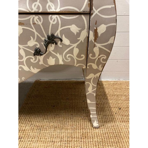 111 - A two drawer bombe commode on down swept legs painted in grey with white tulip detail  l120X56 heigh... 