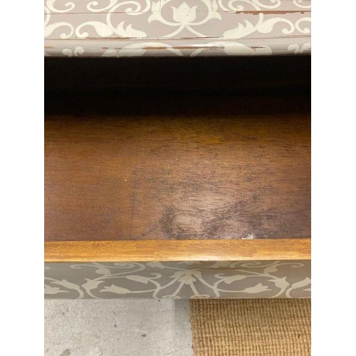 111 - A two drawer bombe commode on down swept legs painted in grey with white tulip detail  l120X56 heigh... 