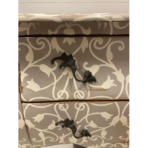 111 - A two drawer bombe commode on down swept legs painted in grey with white tulip detail  l120X56 heigh... 