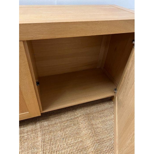 122 - A large light oak sideboard with chrome handles (H90cm W226cm D53cm)