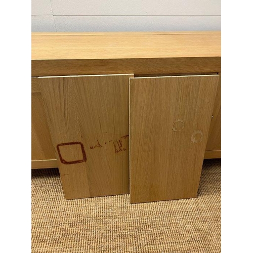 122 - A large light oak sideboard with chrome handles (H90cm W226cm D53cm)