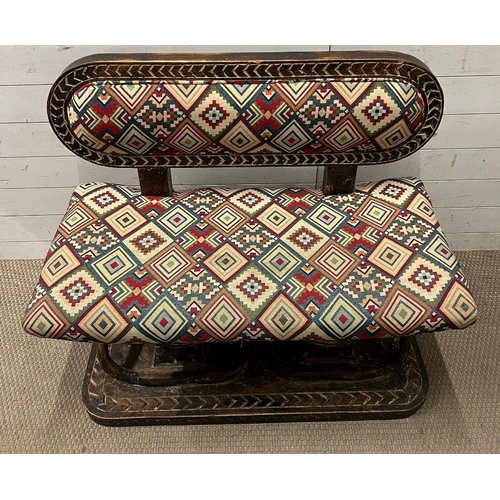 138 - A South African carved bench seat with a kilim style, upholstered and carved birds to back and base
