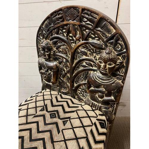 139 - A pair of carved seats with tribal theme carving to back and base