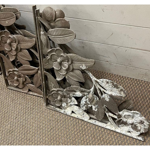 140 - Six pairs of cast iron wall brackets with a floral design (Largest 39cm x 39cm)