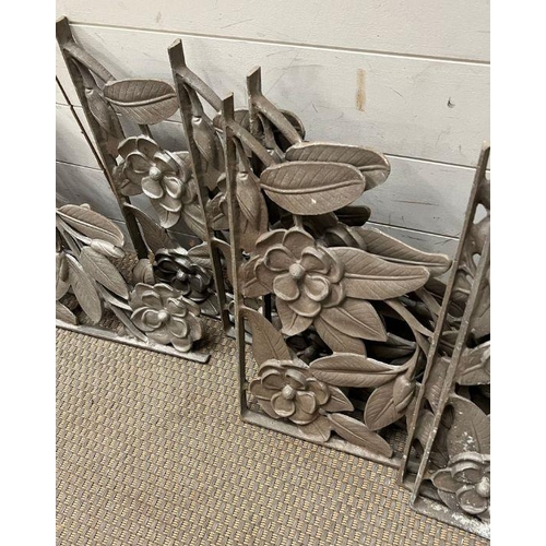 140 - Six pairs of cast iron wall brackets with a floral design (Largest 39cm x 39cm)