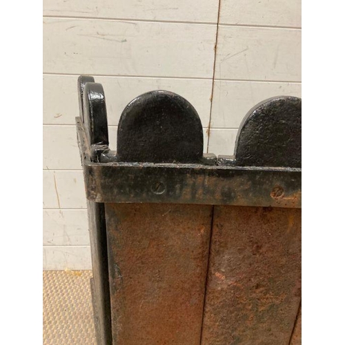 141 - A cast iron fire back casting of a hunting scene