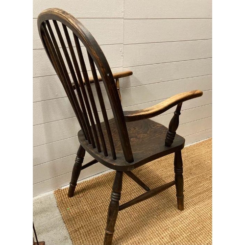 142 - A spindle backed farmhouse arm chair