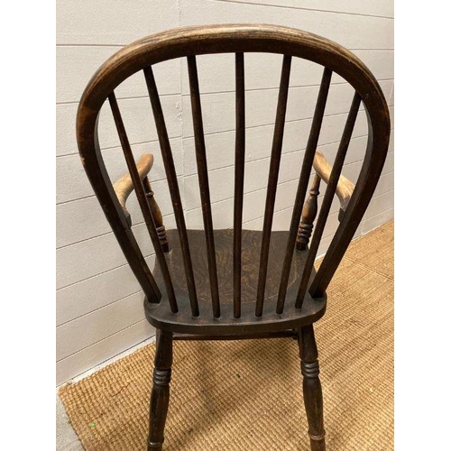 142 - A spindle backed farmhouse arm chair