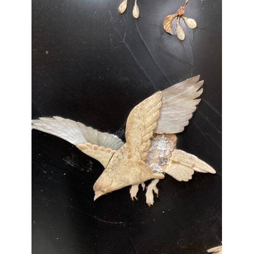 144 - A late 19th century Japanese black laquered screen with mother of pearl and bone bird details. Signe... 