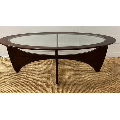 145 - A G-Plan Astro oval table with glass top (H42cm W122cm D66cm)