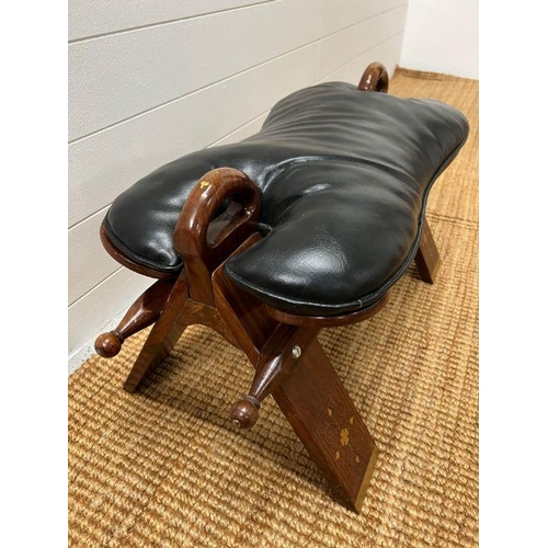 146 - A camel seat with a leather seat pad and inlay brass decorations (H38cm W70cm)