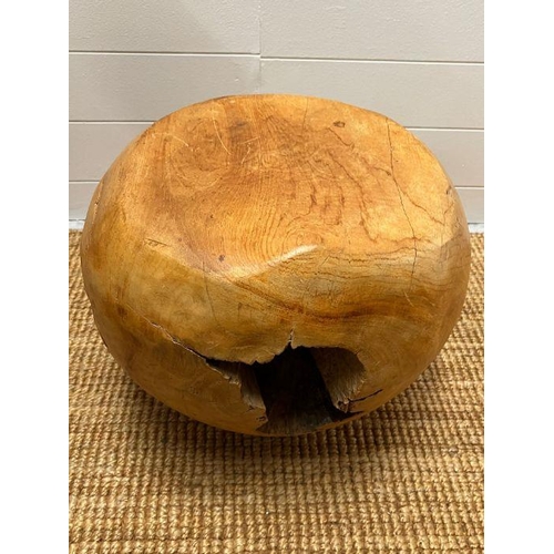 147 - A teak stool with smooth shape with cracks and organic form  (H37cm)
