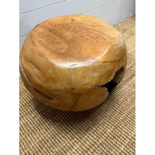 147 - A teak stool with smooth shape with cracks and organic form  (H37cm)