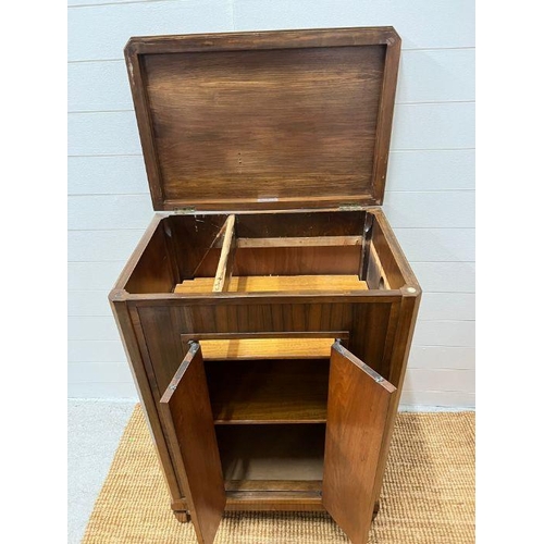 148 - An inlaid cabinet on tapering feet, radiogram cupboard (H100cm W70cm D45cm)