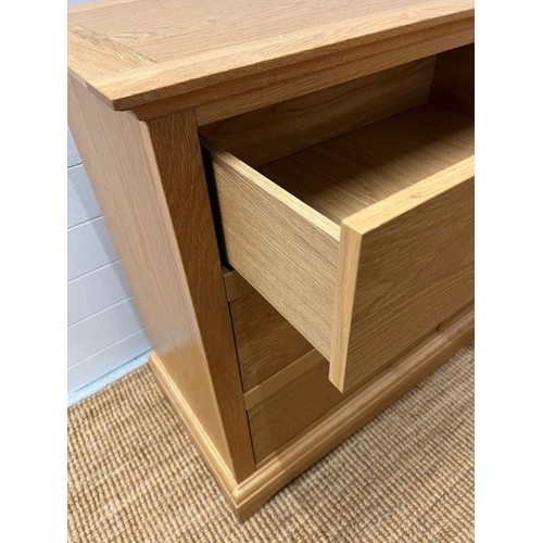 149 - A light oak chest of drawers along with a single bedside (H88cm W132cm D45cm) (Bedside H68cm W51cm D... 