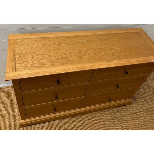 149 - A light oak chest of drawers along with a single bedside (H88cm W132cm D45cm) (Bedside H68cm W51cm D... 