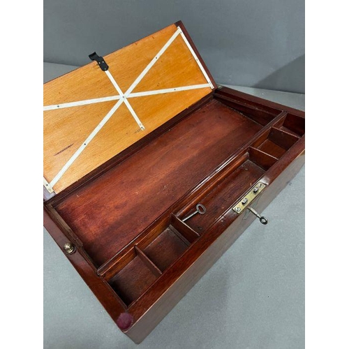 153 - A George III style writing box with brass handles opening to writing slope and compartments