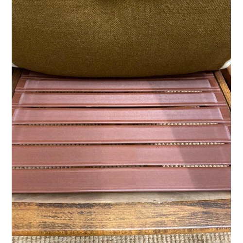 154 - A pair of Norwegian Lied Mobler teak and white leather revolving and reclining chairs