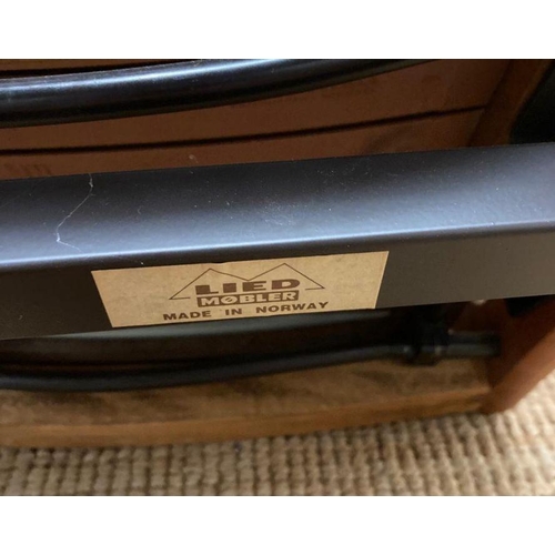 154 - A pair of Norwegian Lied Mobler teak and white leather revolving and reclining chairs