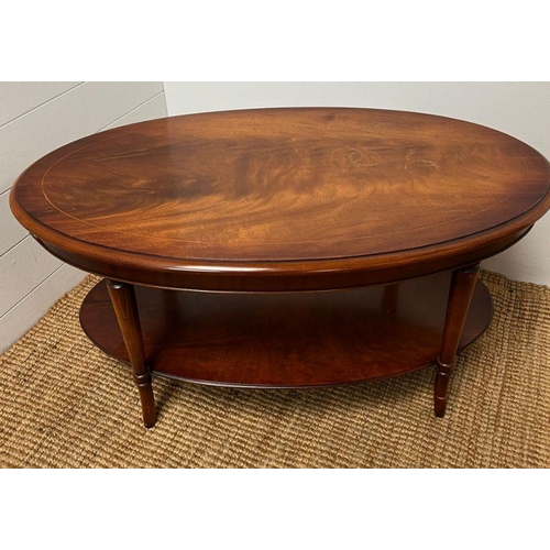 155 - Two tier mahogany oval coffee table (H46cm W95cm D55cm)