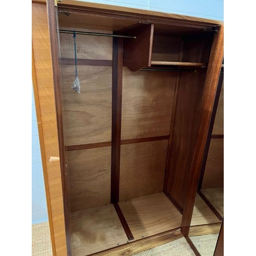 168 - A teak Mid Century wardrobe with mirror to the back of the doors