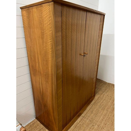 168 - A teak Mid Century wardrobe with mirror to the back of the doors