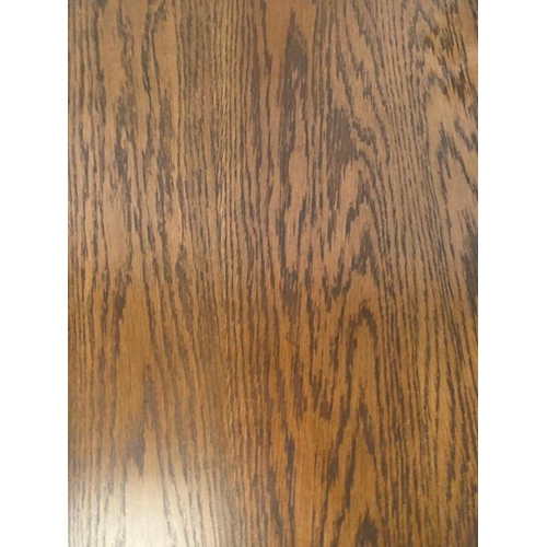 175 - An oak side table on carved central support (H59cm Dia56cm)