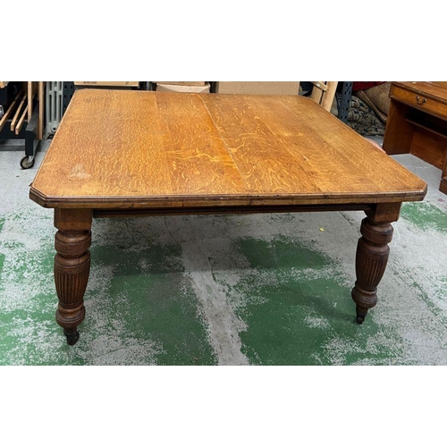247 - Light oak square dining table with fluted baluster turned tapering legs and china castors (H75cm W15... 