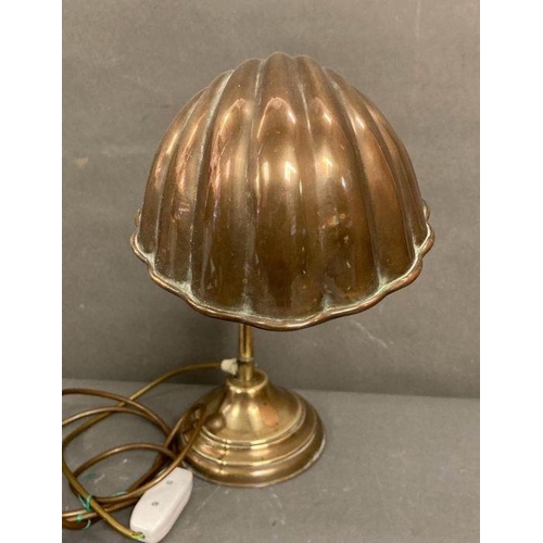 264 - An art deco style brass shell table lamp