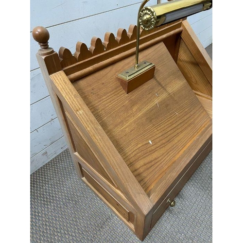 279 - A light oak pulpit with reading light (H65cm W74cm D40cm)