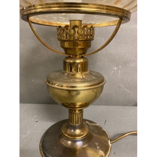 281 - A converted brass oil lamp with iridescent glass shade height 44cm