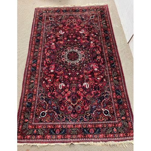 298 - A Hamedan Persian style rug, red grounds 220cm x 140cm