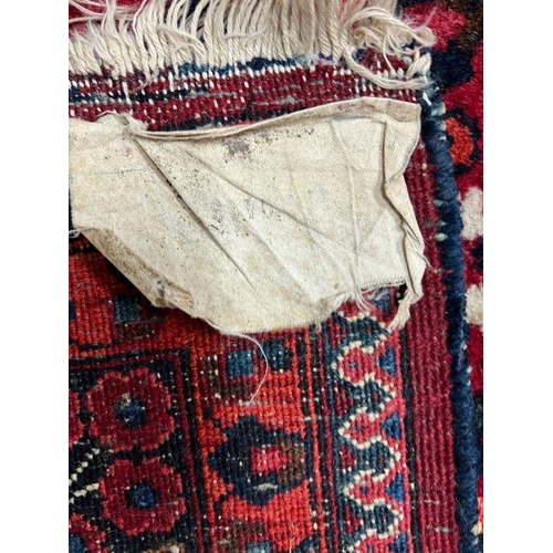 298 - A Hamedan Persian style rug, red grounds 220cm x 140cm