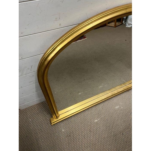 303 - A gilt frame over mantle mirror 81cm x 114cm