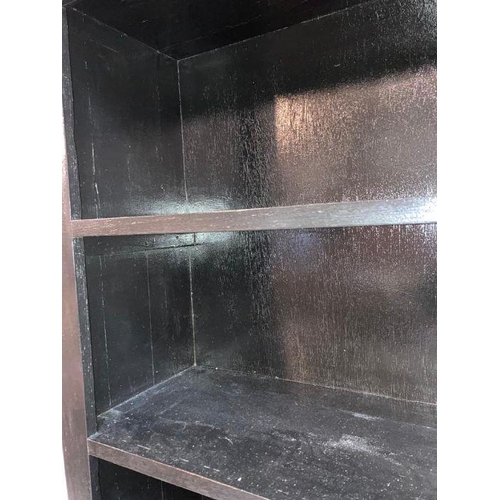 81 - A black painted six shelf book case (H263cm W80cm D34cm)