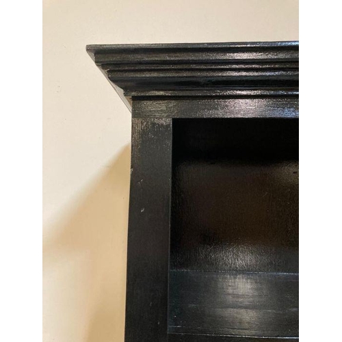 81 - A black painted six shelf book case (H263cm W80cm D34cm)