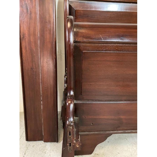 91 - A mahogany sleigh bed with wooden slats and scrolling bed head and stead 5ft x 6ft