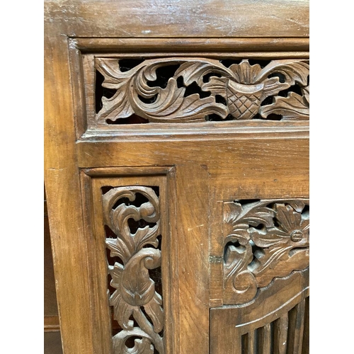 300 - A Tibetan carved wooden mirror with doors 95x79