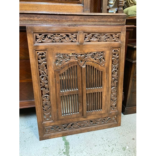 300 - A Tibetan carved wooden mirror with doors 95x79