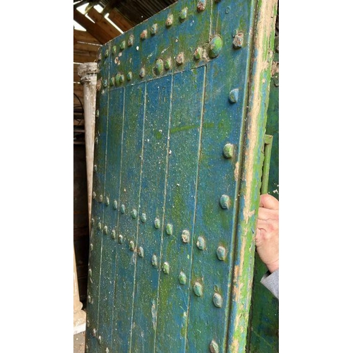 101 - Four oak studded reclaimed doors, possibly 17th century (H206cm W77cm D9cm)