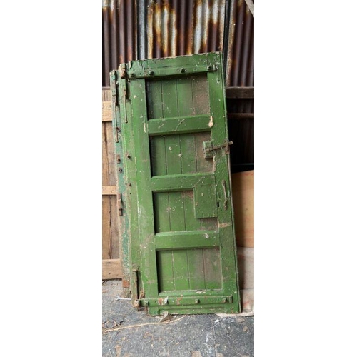 101 - Four oak studded reclaimed doors, possibly 17th century (H206cm W77cm D9cm)