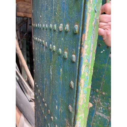 101 - Four oak studded reclaimed doors, possibly 17th century (H206cm W77cm D9cm)