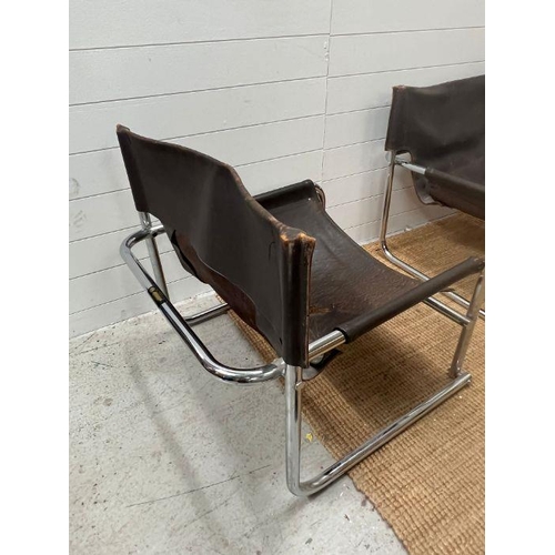 104 - A pair of chrome and leather tubular sling chairs AF