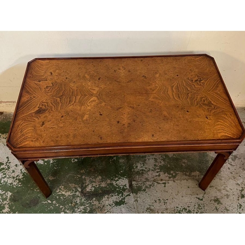 112 - A flamed mahogany coffee table