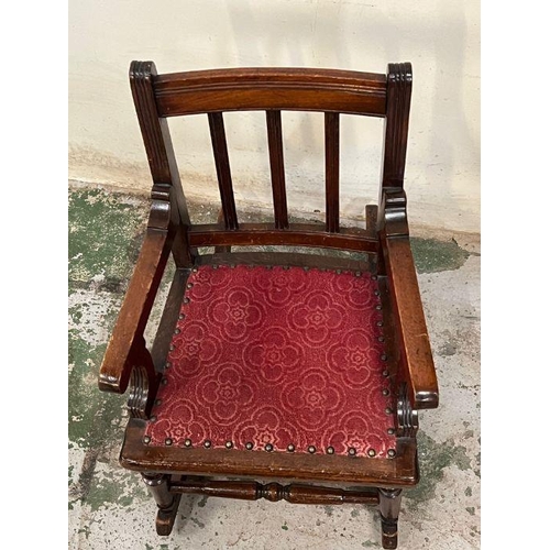 116 - A child's mahogany rocking chair