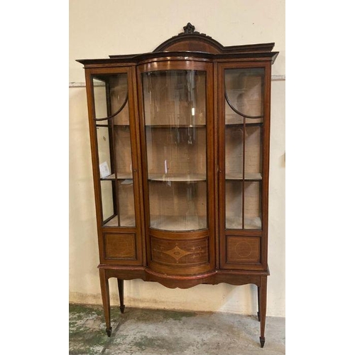 122 - An Edwardian Sheraton revival style inlaid centre bow fronted display cabinet (H210cm W110cm D42cm)