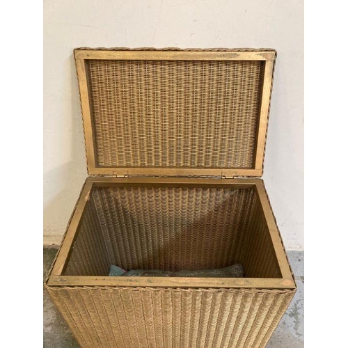 124 - A gold painted wicker laundry basket