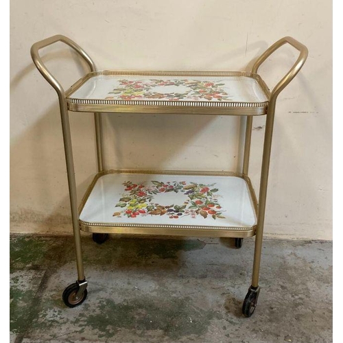 130 - A Mid Century two tier tea trolly on castors